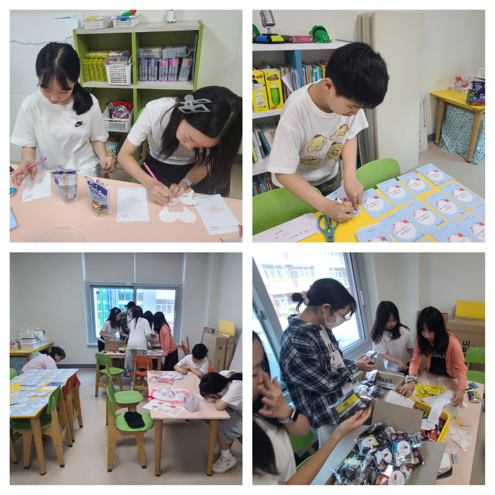 열심히 편지들을 모으고, 쓰고, 선물 포장하는 수원愛통통봉사단