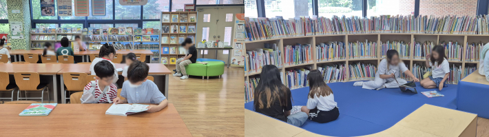 도서관에서 형제맺기한 형동생이 같이 책을 읽고 있다.