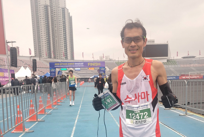 10km 1등은 '수사마  협회' 김회묵 선수(배번호 : 12472)가 31분 59초